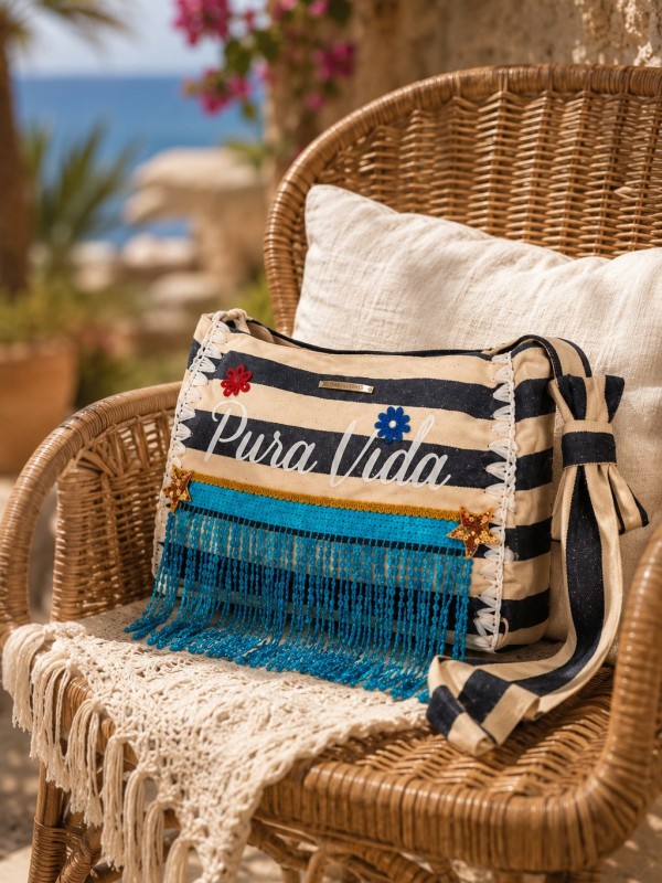 Borsa Tracolla Pura Vida con dettagli floreali e frange